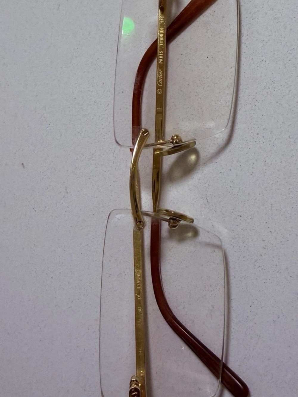 Cartier Gold Rimless Eyeglasses with Brown Temples